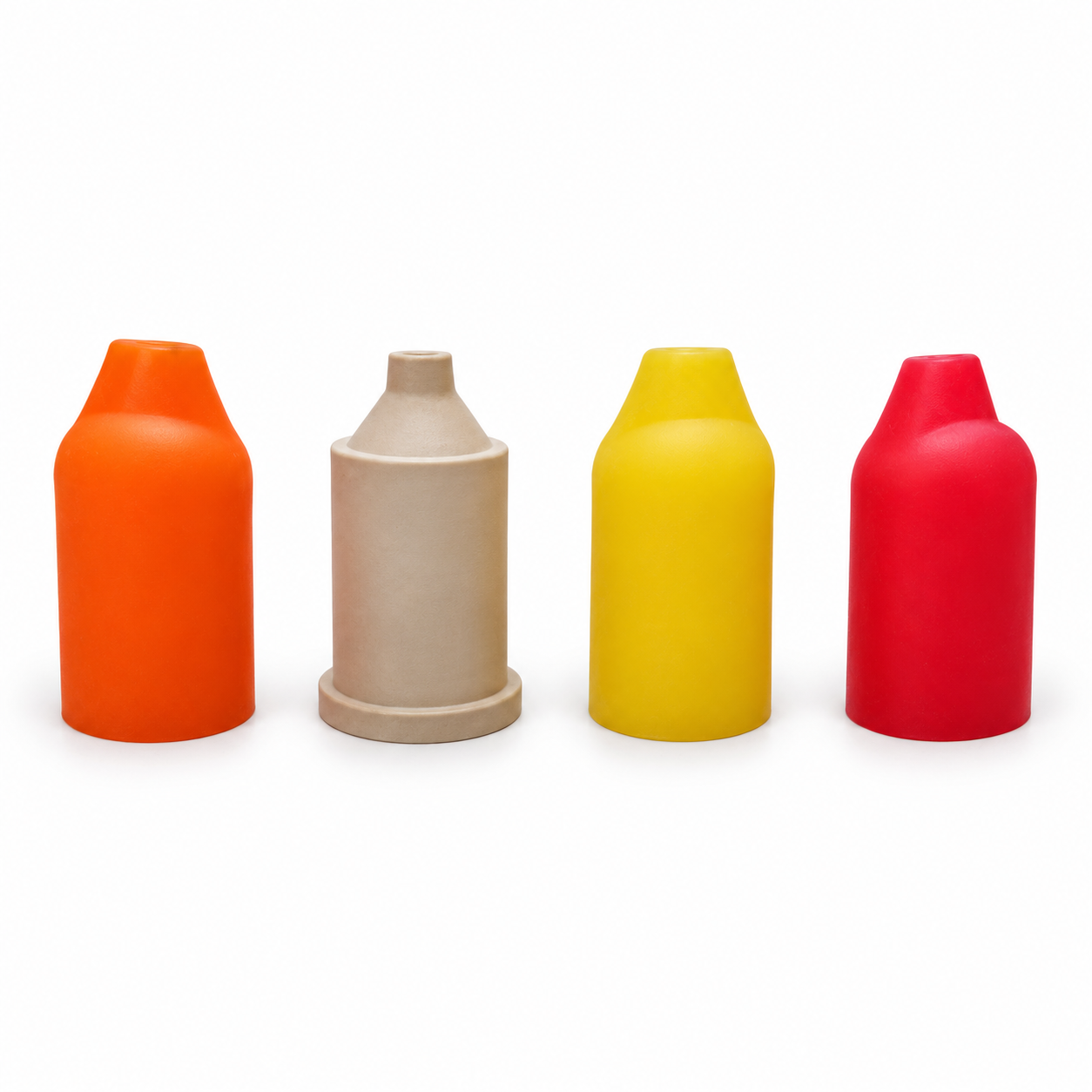 Cuatro piezas moldeadas de silicona en distintos colores